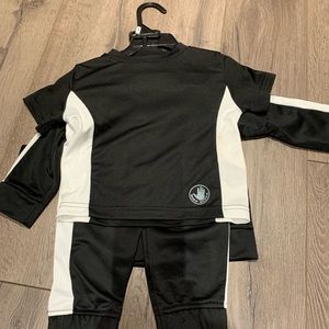NWT. Baby boy 3 piece set size 12 months. Body glove.